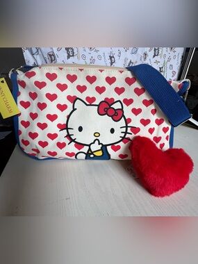 Hello Kitty Canvas Crossbody Bag in Red, Blue, Cream with Plush Red Heart Charm